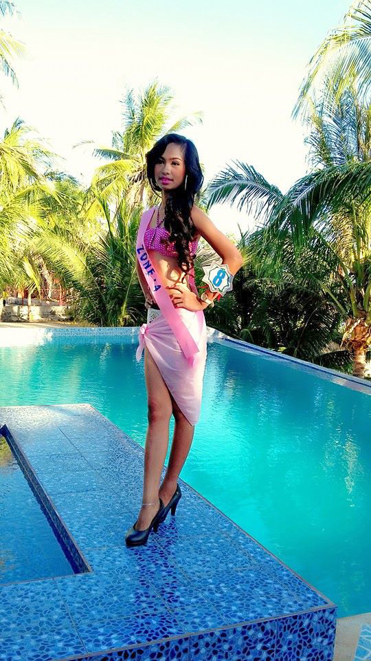 Brunette girl wearing pink bikini and black high heels for Miss Virgen 2015